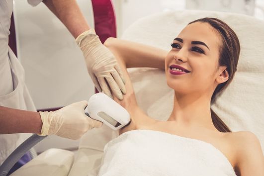 A woman undergoing laser hair removal 
